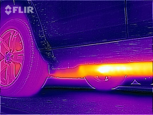 Thermal image of undercarriage of a car in the garage.